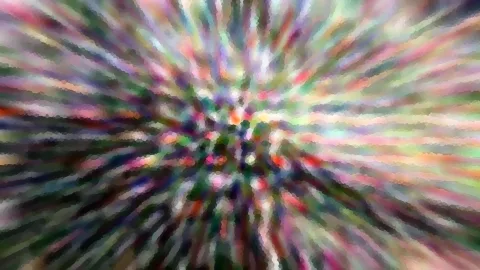 Abstrakte Komposition aus bunten, radial von einem Zentrum ausgehenden Streifen in Grün, Rosa, Violett und Orange, verpixelt und unscharf.