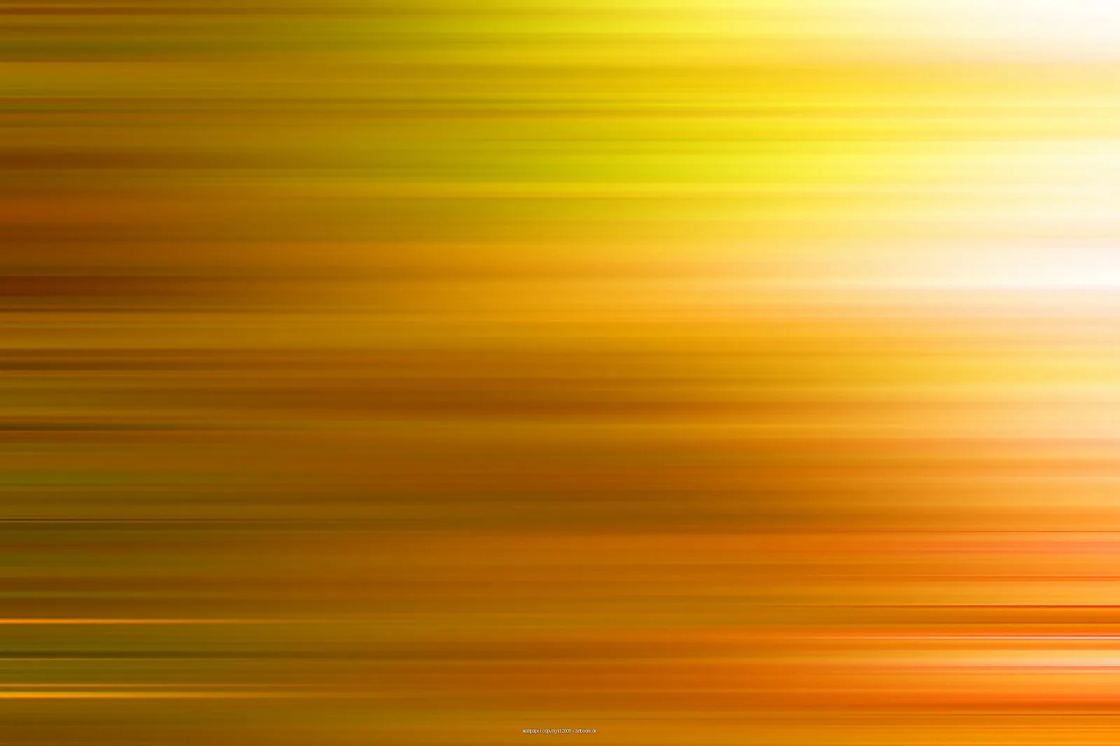 Horizontal verwischte Streifen in Gelb, Orange und Weiß, rechts oben am hellsten.