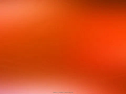 Abstrakte Fläche aus Orange- und Rottönen mit weichen, verschwommenen Verläufen, unten hell in Rosa übergehend.