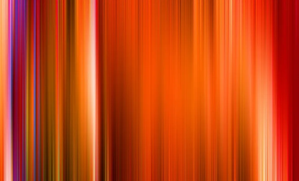 Abstrakte Komposition aus dicht nebeneinander stehenden, vertikalen Streifen in Orange, Rot, Magenta und Gelb mit weichen Übergängen.