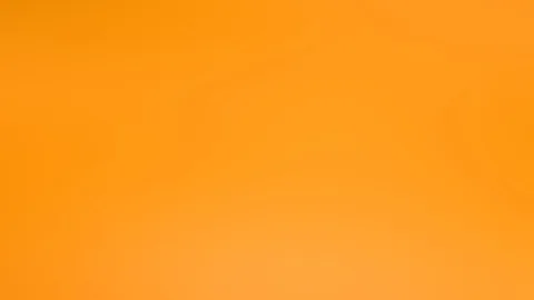 Gleichmäßiger orangefarbener Farbverlauf, oben etwas dunkler, unten heller, ohne erkennbare Motive.