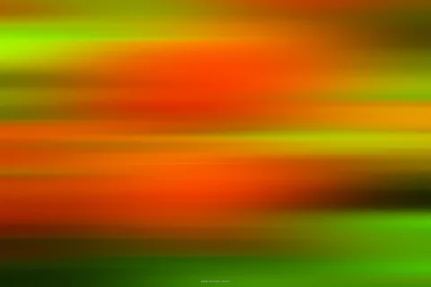Horizontale, verwischte Streifen in Orange, Rot, Gelb und Grün, die ineinander übergehen.