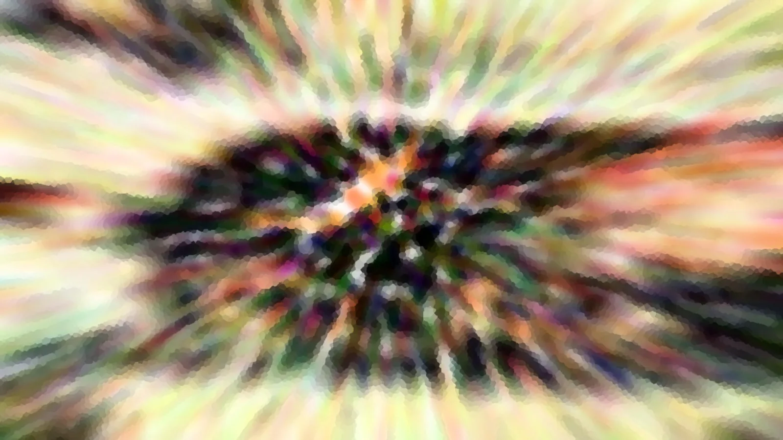 Abstraktes Bild mit farbigen Strahlen, die von einem dunklen Zentrum nach außen laufen, in Gelb, Grün, Orange und Rot.
