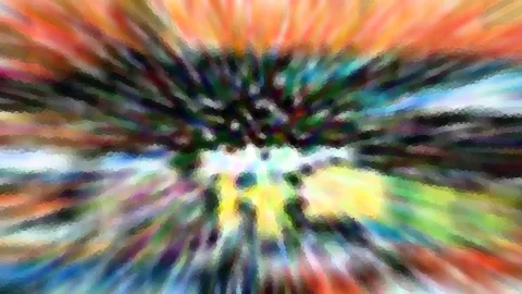 Abstrakte Komposition aus radial verwischten Farbstrahlen in Orange, Grün, Gelb und Blau mit mosaikartiger Pixelstruktur.