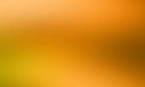 Unscharfer Farbverlauf von hellem Orange oben über sattes Orange bis zu Gelbgrün unten links
