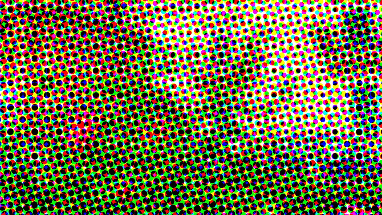 Dichtes Raster aus farbigen Punkten in Rot, Gelb, Blau, Magenta, Cyan und Schwarz auf grünem Grund, im oberen rechten Bereich heller werdend.