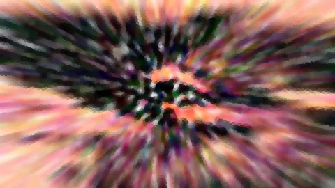 Abstrakte Komposition aus bunten Farbstreifen in Rosa, Orange und Grün, die von einem dunklen Zentrum radial nach außen strahlen und mosaikartig gepixelt sind.