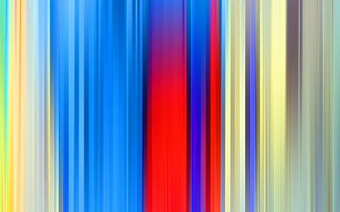 Abstrakte vertikale Streifen in Blau, Rot, Gelb und Grün, unscharf verwischt nebeneinander angeordnet.