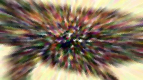 Abstraktes Bild mit farbigen Streifen, die vom Zentrum nach außen strahlen, in Grün, Violett, Rot und Gelb, mit weichen Verwischungen und pixeligen Strukturen.