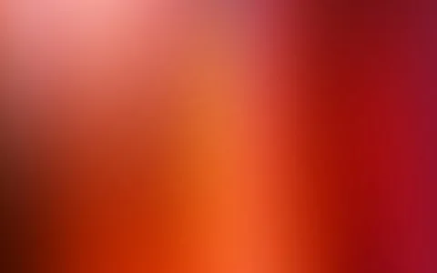 Unscharfer Verlauf von Rot und Orange, links heller, rechts dunkler werdend mit Magenta-Ton