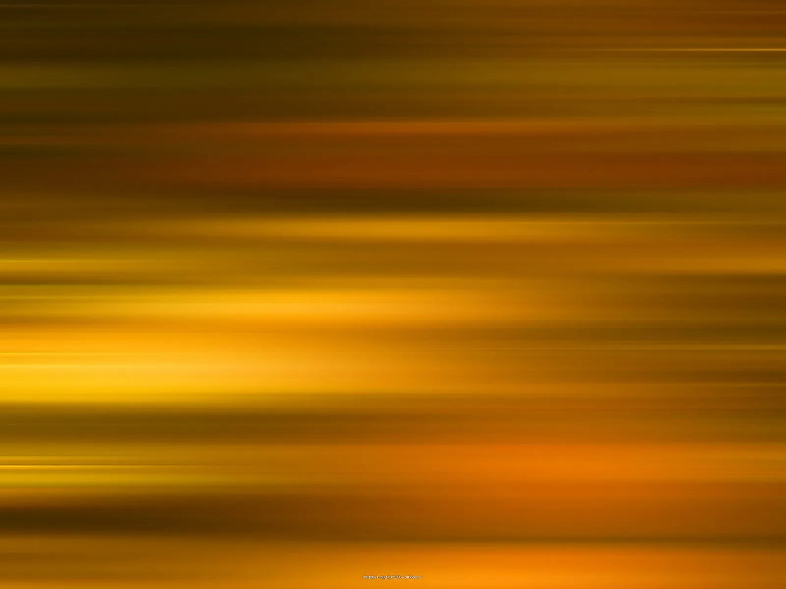 Abstrakte horizontale Streifen in Gelb, Gold und Orange, weich verlaufend wie eine Bewegungsunschärfe.