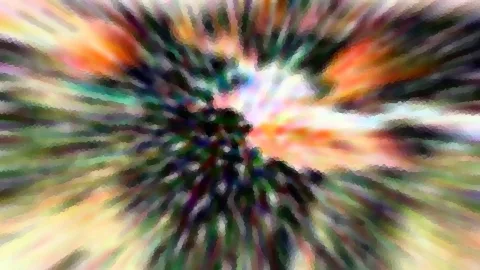 Abstrakte radiale Unschärfe mit farbigen Strahlen in Orange, Grün und Weiß, mosaikartig gepixelt, das Zentrum hell.