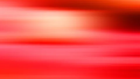 Horizontal verwischte Streifen in Rot und Orange mit einem hellen Leuchten in der oberen Bildmitte und dunklem Rotbraun am rechten Rand.