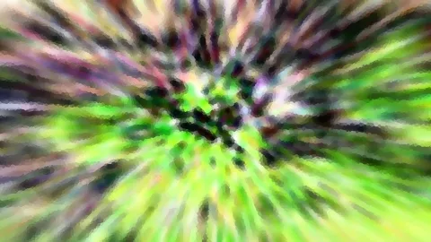 Abstrakte, radial verwischte Farbfläche in Grün, Violett und Gelb mit mosaikartiger Struktur und dunklem Zentrum.