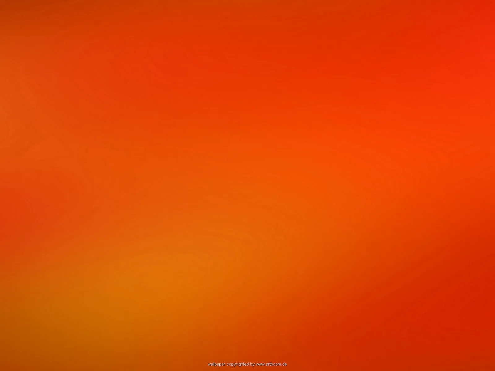 Unscharfer Farbverlauf in Orange und Rot mit gelblichen Akzenten im unteren linken Bereich, am unteren Rand eine kleine Copyright-Zeile.