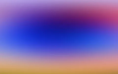 Unscharfer Farbverlauf: Dunkelblaue Mitte, violette und rosafarbene Töne oben rechts, unten in warmem Gelb-Orange.