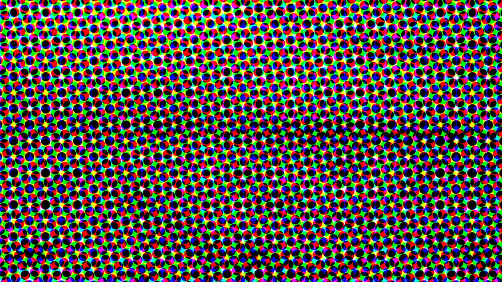 Dichtes, regelmäßiges Muster aus kleinen farbigen Kreisen in Rot, Grün, Blau, Gelb, Magenta und Schwarz auf hellem Raster.