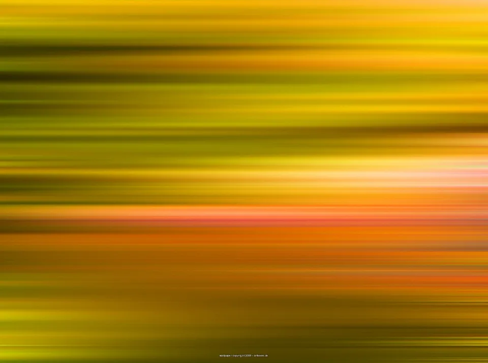 Abstrakte horizontale Schlieren in Gelb, Grün, Orange und Rosa, die durch Bewegungsunschärfe entstehen.