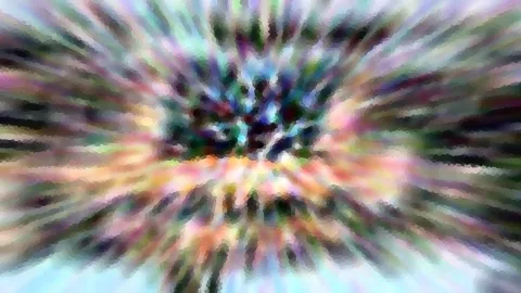Abstraktes Bild mit radialem Zoomeffekt: Bunte Farbstreifen laufen von einem dunklen, unscharfen Zentrum nach außen, durchsetzt mit mosaikartigen Pixelstrukturen.