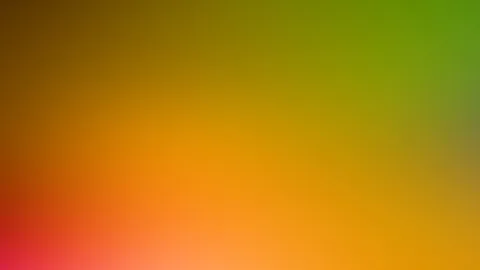 Unscharfer Farbverlauf von dunklem Braun oben links über Orange bis zu Rot unten links und Grün oben rechts.