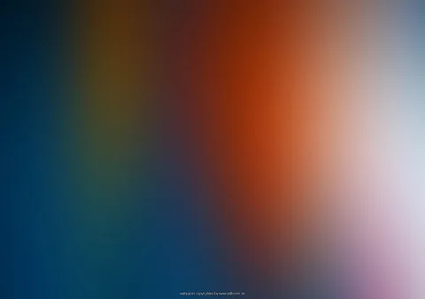 Unscharfer Farbverlauf von dunklem Blau links über Gelb und Orange bis zu hellem Weiß und Rosa rechts, mit einem kleinen Wasserzeichen am unteren Rand.