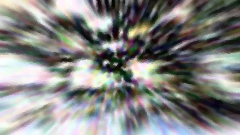 Abstraktes Bild mit radialem Zoomeffekt: helle Farbstreifen in Grün, Violett und Weiß strahlen von einem dunklen Zentrum nach außen, die Kanten wirken pixelig.