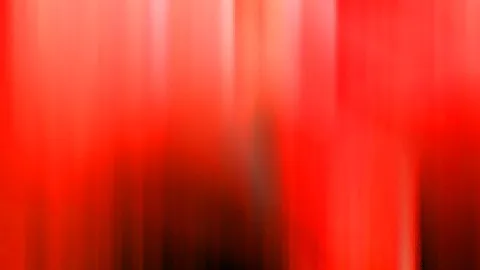 Abstraktes Bild aus vertikalen roten Schlieren, die nach unten in Schwarz übergehen