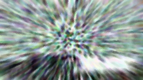 Abstraktes Bild mit radial von der Mitte nach außen laufenden, verwischten Streifen in Grün, Violett und Weiß mit pixeliger Struktur.