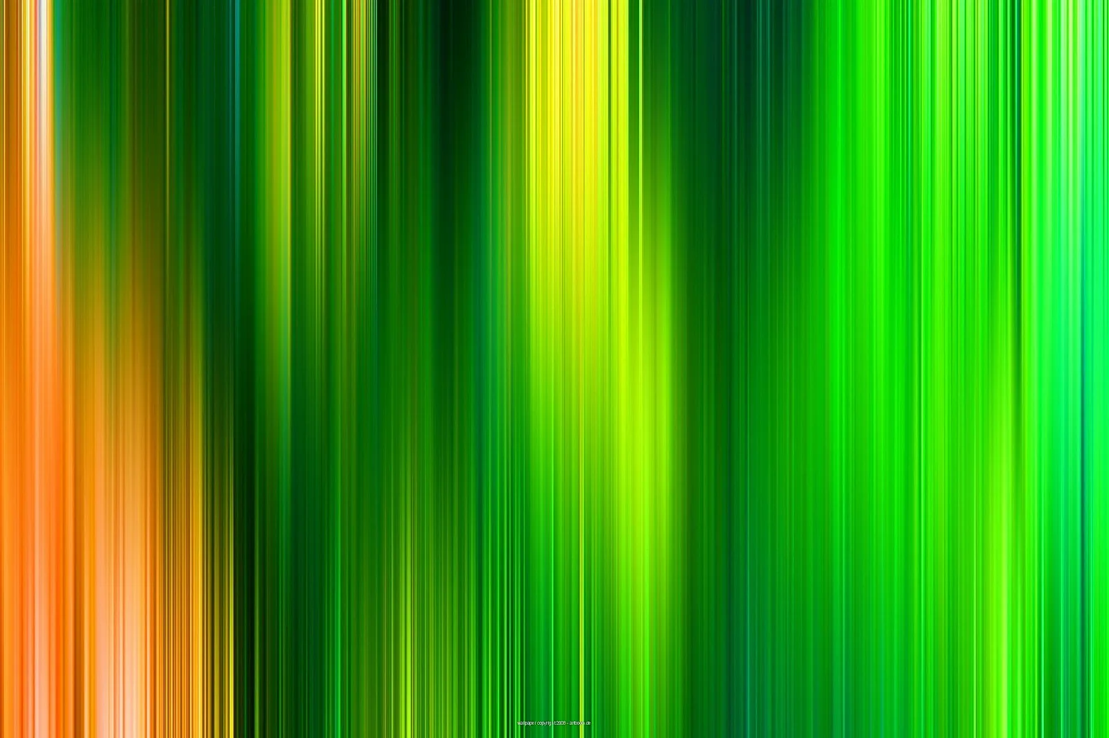 Abstrakte vertikale Streifen in Grün, Gelb und Orange, die wie verwischte Lichtstrahlen nebeneinander stehen. Links dominiert Orange, rechts ein kräftiges Grün.
