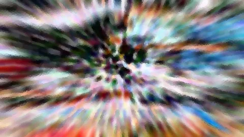 Abstraktes Bild mit bunten Farbstrahlen, die von einem dunklen Zentrum in der Mitte nach außen laufen, leicht verwischt und mosaikartig gerastert.