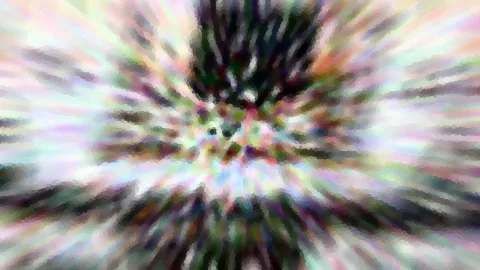 Abstrakte radiale Unschärfe mit bunten Farbstreifen, die von einem hellen Zentrum nach außen laufen, dunkle Schlieren oben und unten.