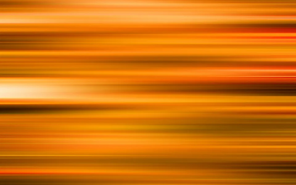 Horizontale, verwischte Streifen in Orange, Gelb und Rot mit dunklen braunen Akzenten.