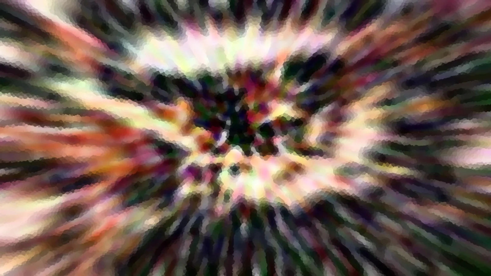 Abstraktes Bild mit bunten, unscharfen Farbstreifen, die von einem dunklen Zentrum radial nach außen laufen.
