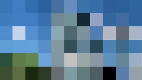 Raster aus großen quadratischen Pixelfeldern in Blau-, Grau- und Grüntönen, unten einige dunkle und grüne Felder.