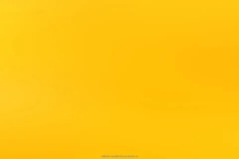 Flächiger gelber Farbverlauf, nach links oben heller, nach rechts unten etwas satter und orangefarbener, mit dem kleinen Schriftzug wallpaper copyrighted by www.artboom.de am unteren Rand.