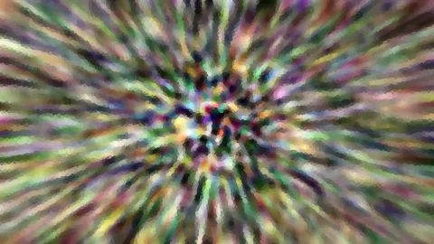 Bunte Farbstrahlen laufen radial von einem hellen Zentrum nach außen, verwischt und mosaikartig gepixelt.