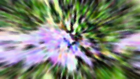 Abstraktes Bild mit radialer Bewegungsunschärfe in Grün, Violett und Weiß, das von einem hellen Zentrum nach außen strahlt.