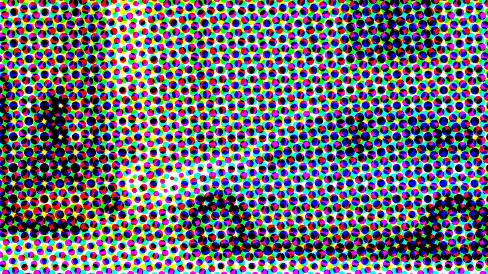 Dichtes Raster aus kleinen bunten Punkten in Rot, Grün, Blau, Gelb, Cyan und Magenta, dazwischen schwarze Punkte und helle Lücken.