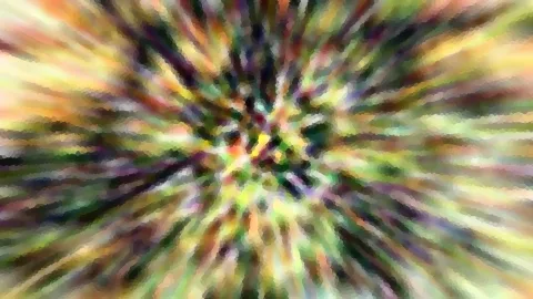 Abstraktes Bild aus bunten Farbstreifen, die von einem Zentrum in der Bildmitte radial nach außen laufen, grob gerastert wie ein Mosaik.