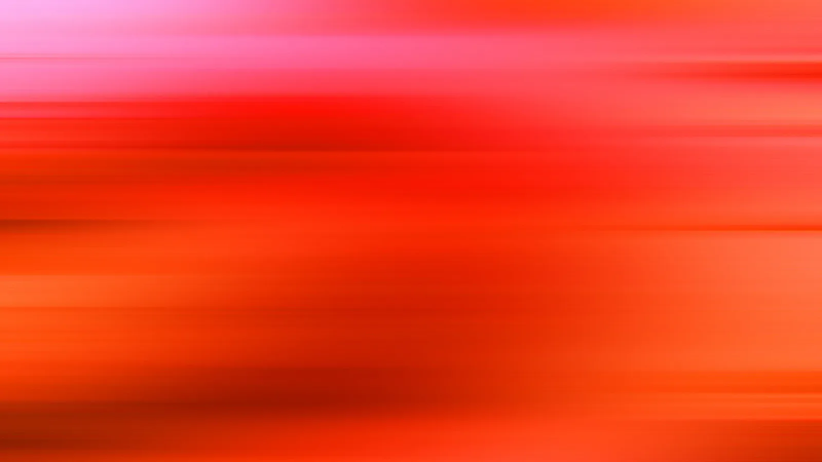 Abstrakter Hintergrund aus horizontalen roten und orangefarbenen Streifen, am oberen Rand verläuft die Farbe in Rosa.