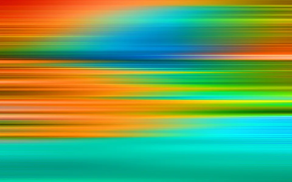 Horizontal verlaufende, unscharfe Streifen in Orange, Gelb, Grün, Blau und Türkis, dicht übereinander angeordnet.