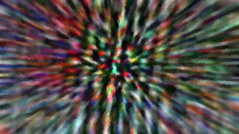 Bunte Farbstreifen laufen von einer dunklen Mitte radial nach außen, pixelig und unscharf.