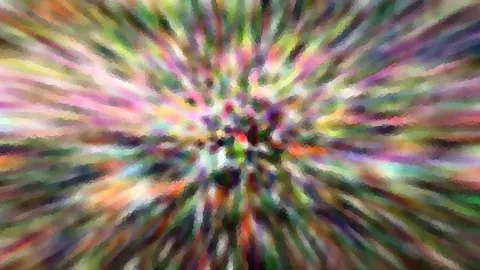 Abstraktes Bild mit bunten Farbstreifen, die von einem Zentrum in der Mitte nach außen strahlen, im Stil eines Zoom-Effekts mit mosaikartiger Körnung.