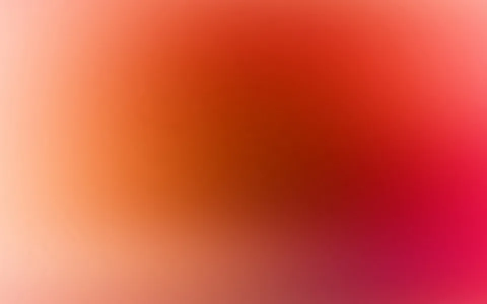 Unscharfer Farbverlauf von hellem Apricot links über tiefes Rot in der Mitte bis zu kräftigem Pink rechts unten.