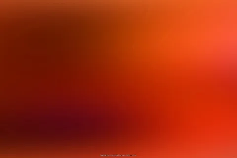 Unscharfer Verlauf von dunklem Rot links unten zu hellem Orange rechts oben