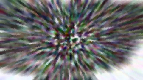 Abstraktes Bild mit farbigen Streifen, die von einem Zentrum in der Mitte nach außen strahlen, grob gepixelt.