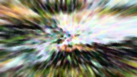 Abstraktes Bild mit farbigen Strahlen, die von einem hellen Zentrum nach außen laufen. Grün, Gelb, Rosa und Weiß sind verschwommen und pixelig ineinandergezogen.