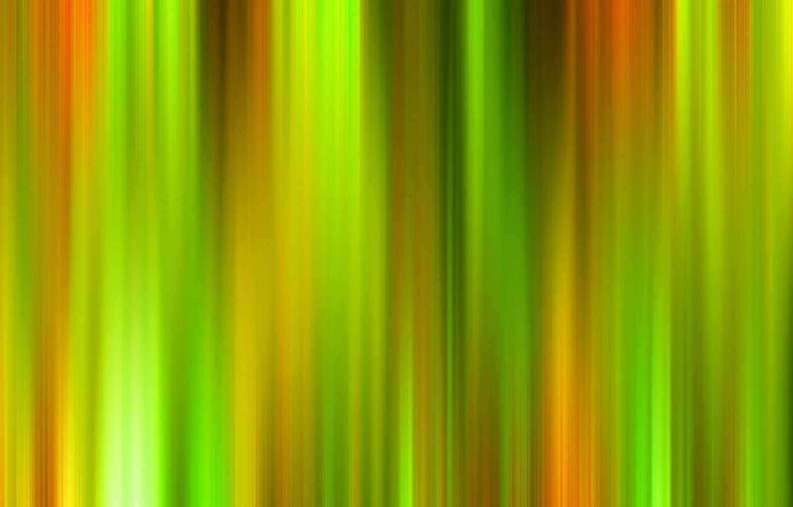 Abstraktes Bild aus senkrechten, unscharf verlaufenden Streifen in Grün, Gelb, Orange und Dunkelbraun.