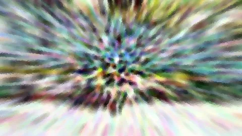 Abstrakte, bunte Radialstruktur aus verwischten Pixelflächen in Grün, Rosa und Weiß.