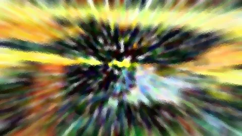 Abstrakte Komposition aus radial verlaufenden, verwischten Farbstreifen in Gelb, Orange, Grün und Blau mit dunklem Zentrum.